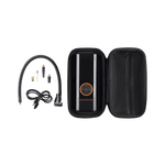 Rad Portable Tire Inflator in a black carrying case with mesh zip pocket and air hose with Q/R Schrader Head, USB-C charging cable, and four valve adaptors.
