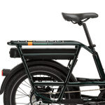 The right side of a green bike with a range extender under the rear rack. 